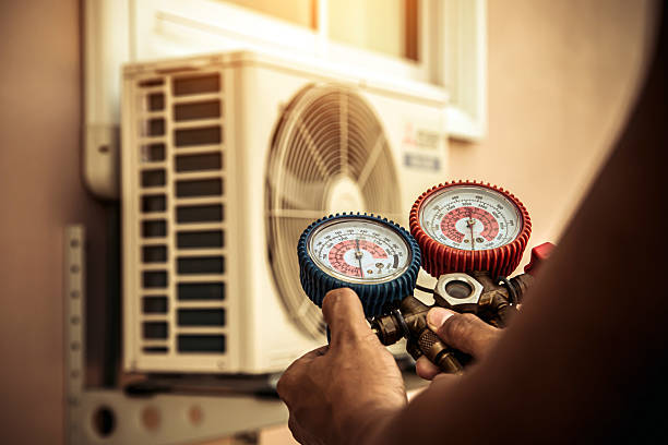 Professional Heat Pump Repair technician working in Sandy, OR